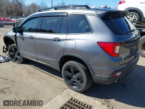 2021 Honda Passport Elite with VIN 5FNYF8H07MB018359, listed as a IAAI auction lot 41834413 with 28,278 mi miles and . Bid and sale history available at DreamBid. Image 3.