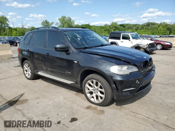 2012 BMW X5 35i with VIN 5UXZV4C59CL752661, listed as a Copart auction lot 58590305 with 101,725 mi miles and Salvage title. Bid and sale history available at DreamBid. Image 4.