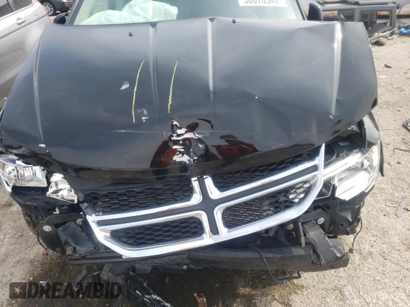 2017 Dodge Journey SXT with VIN 3C4PDDBG8HT520725, listed as a Copart auction lot 38070542 with 103,325 mi miles and Salvage title. Bid and sale history available at DreamBid. Image 7.