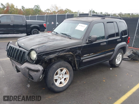 2003 Jeep Liberty Sport with VIN 1J4GK48KX3W656837, listed as a IAAI auction lot 40785615 with 164,450 mi miles and . Bid and sale history available at DreamBid. Image 2.