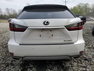 2021 Lexus RX with VIN 2T2HZMDA7MC277979, listed as a Copart auction lot 51810635 with 61,000 mi miles and Salvage Title. Bid and sale history available at carsss.com. Image 6.