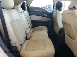 2015 Ford Edge SE with VIN 2FMTK3G9XFBB70947, listed as a Copart auction lot 58873715 with 142,233 mi miles and Salvage title. Bid and sale history available at DreamBid. Image 11.