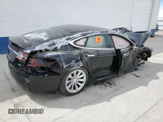 2016 Tesla Model S 90D with VIN 5YJSA1E23GF167938, listed as a Copart auction lot 51703075 with Not provided miles and Salvage title. Bid and sale history available at DreamBid. Image 3.