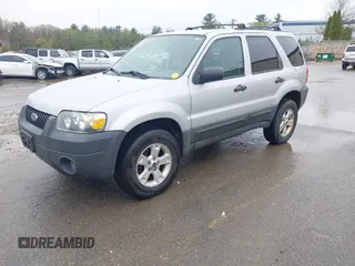 2005 Ford Escape XLT with VIN 1FMCU93115KC10947, listed as a IAAI auction lot 42215066 with 128,475 mi miles and . Bid and sale history available at DreamBid. Image 2.