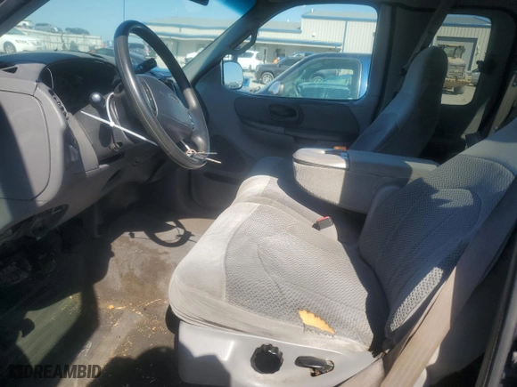 1999 Ford F-150 Work Series with VIN 1FTRX18W9XNA74452, listed as a Copart auction lot 75307294 with 152,631 mi miles and Salvage Title. Bid and sale history available at carsss.com. Image 7.