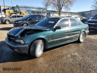 2000 BMW 5 Series 540iA with VIN WBADN6342YGM69093, listed as a Copart auction lot 89176705 with 0 mi miles and Salvage Title. Bid and sale history available at carsss.com. Image 1.