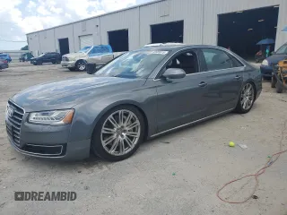 2015 Audi A8 4.0T with VIN WAU32AFD5FN040395, listed as a Copart auction lot 60909515 with 79,379 mi miles and Salvage title. Bid and sale history available at DreamBid. Image 1.