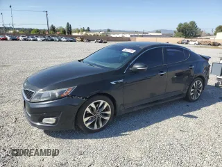 2015 Kia Optima SX Turbo with VIN 5XXGR4A6XFG454049, listed as a Copart auction lot 52217185 with 115,675 mi miles and Salvage Title. Bid and sale history available at carsss.com. Image 1.