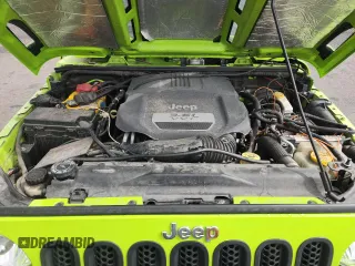2012 Jeep Wrangler Unlimited Call of Duty MW3 z VIN 1C4BJWFG4CL242211, wystawiony jako Copart lot #59774555 z przebiegiem 117 463 mil mil oraz Szkoda całkowita • Salvage title. Historia ofert i sprzedaży dostępna na DreamBid. Obrazek 11.