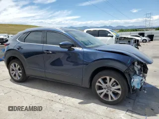 2022 Mazda CX-30 S Premium with VIN 3MVDMBDL9NM446527, listed as a Copart auction lot 63291275 with 17,035 mi miles and Salvage title. Bid and sale history available at DreamBid. Image 4.