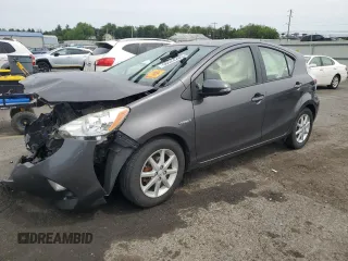 2014 Toyota Prius One z VIN JTDKDTB33E1066355, wystawiony jako Copart lot #58524285 z przebiegiem Nie podano mil oraz Szkoda całkowita • Salvage title. Historia ofert i sprzedaży dostępna na DreamBid. Obrazek 1.