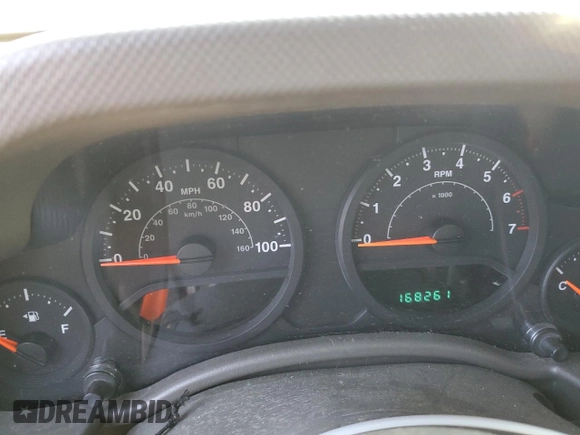 2009 Jeep Wrangler X with VIN 1J4FA24139L730383, listed as a Copart auction lot 51914935 with 168,265 mi miles and Salvage Title. Bid and sale history available at DreamBid. Image 9.