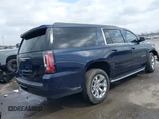 2017 GMC Yukon XL SLT with VIN 1GKS1GKC0HR319058, listed as a IAAI auction lot 41667612 with 116,695 mi miles and . Bid and sale history available at carsss.com. Image 4.