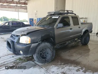 2004 Nissan Frontier LE with VIN 1N6ED27T74C416960, listed as a Copart auction lot 63828485 with 354,553 mi miles and Salvage title. Bid and sale history available at DreamBid. Image 1.
