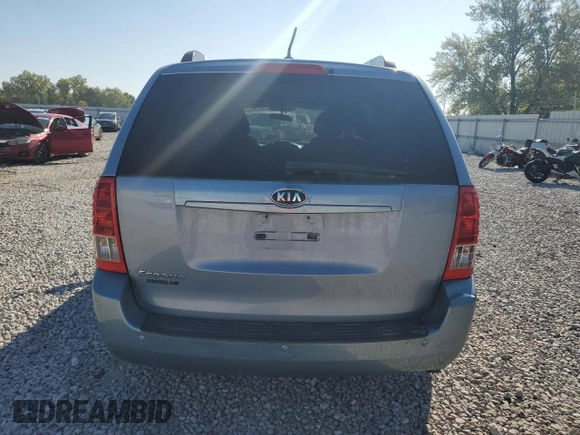 2012 Kia Sedona LX with VIN KNDMG4C70C6447748, listed as a Copart auction lot 71377294 with 146,057 mi miles and Salvage Title. Bid and sale history available at carsss.com. Image 6.