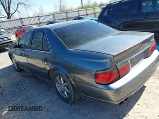 2003 Cadillac Seville Luxury SLS z VIN 1G6KS54Y43U158390, wystawiony jako IAAI lot #41977830 z przebiegiem 299 000 mil mil oraz . Historia ofert i sprzedaży dostępna na DreamBid. Obrazek 3.