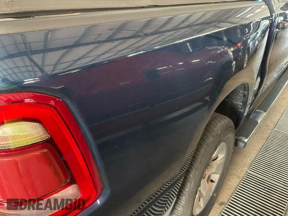 2023 Ram 1500 Big Horn with VIN 1C6RRFFG7PN561014, listed as a IAAI auction lot 42836551 with 24,934 mi miles and . Bid and sale history available at DreamBid. Image 6.