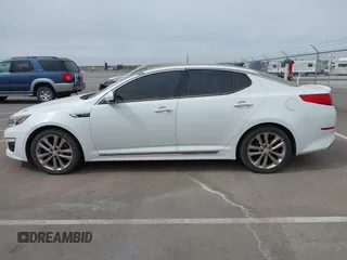 2015 Kia Optima SX Turbo with VIN 5XXGR4A69FG361006, listed as a IAAI auction lot 41870382 with 150,084 mi miles. Bid and sale history available at carsss.com. Image 14.