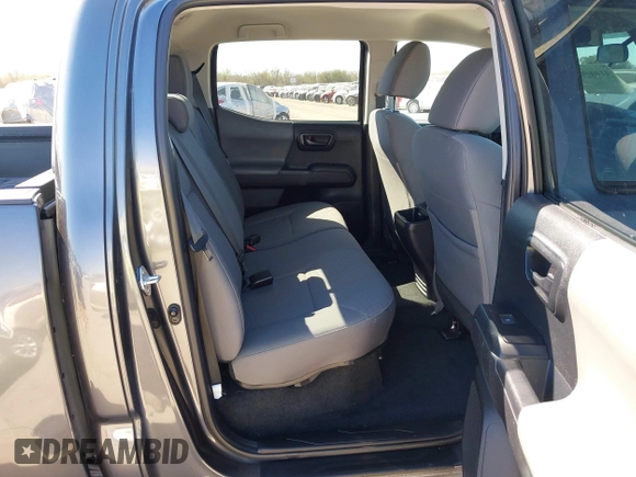 2023 Toyota Tacoma 4WD SR with VIN 3TYCZ5AN1PT146719, listed as a IAAI auction lot 41406963 with 19,735 mi miles. Bid and sale history available at carsss.com. Image 8.