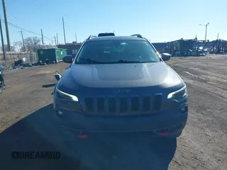 2019 Jeep Cherokee Trailhawk with VIN 1C4PJMBX6KD410391, listed as a IAAI auction lot 41821355 with 79,473 mi miles and . Bid and sale history available at DreamBid. Image 13.