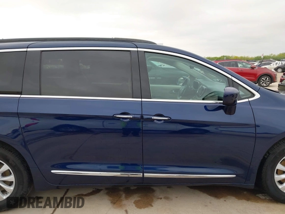 2017 Chrysler Pacifica Touring L with VIN 2C4RC1BG2HR526422, listed as a IAAI auction lot 42032839 with 180,710 mi miles and . Bid and sale history available at DreamBid. Image 13.