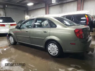 2004 Suzuki Forenza S z VIN KL5JD52Z14K975804, wystawiony jako Copart lot #43227455 z przebiegiem 114 726 mil mil oraz Szkody całkowita. Historia ofert i sprzedaży dostępna na DreamBid. Obrazek 2.