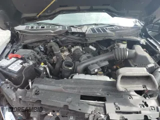 2023 Ford F-150 XL with VIN 1FTEW1C83PFA84267, listed as a Copart auction lot 65042545 with 54,508 mi miles and Salvage title. Bid and sale history available at DreamBid. Image 11.