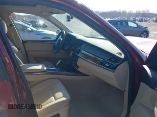 2011 BMW X5 35i with VIN 5UXZV4C52BL413125, listed as a IAAI auction lot 41697824 with 136,828 mi miles. Bid and sale history available at carsss.com. Image 5.