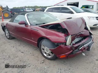 2004 Ford Thunderbird Deluxe z VIN 1FAHP60A24Y104500, wystawiony jako IAAI lot #41952791 z przebiegiem 100 795 mil mil oraz . Historia ofert i sprzedaży dostępna na DreamBid. Obrazek 1.