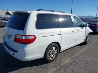 2006 Honda Odyssey EX z VIN 5FNRL38486B410286, wystawiony jako IAAI lot #41641433 z przebiegiem 145 312 mil mil oraz . Historia ofert i sprzedaży dostępna na DreamBid. Obrazek 4.