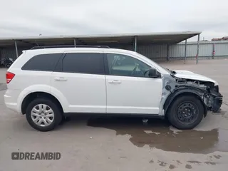 2020 Dodge Journey SE Value with VIN 3C4PDCAB4LT254595, listed as a IAAI auction lot 41572159 with 124,804 mi miles and . Bid and sale history available at carsss.com. Image 14.