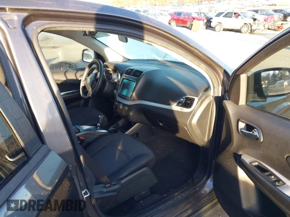2018 Dodge Journey SXT with VIN 3C4PDCBB6JT208889, listed as a IAAI auction lot 41099570 with 104,791 mi miles and . Bid and sale history available at DreamBid. Image 5.