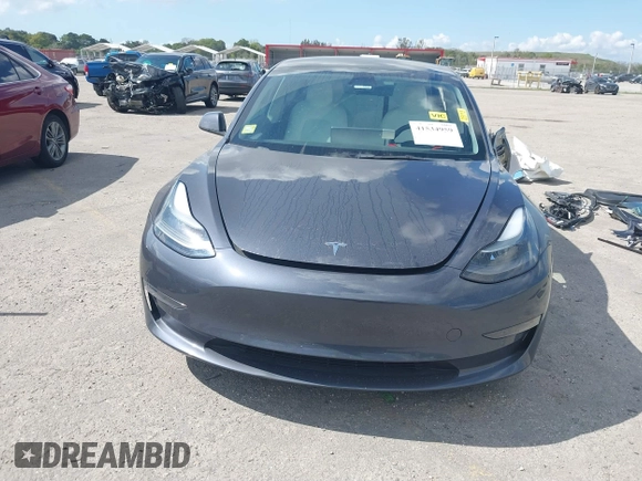 2022 Tesla Model 3 Performance with VIN 5YJ3E1EC9NF201184, listed as a IAAI auction lot 41534959 with 29,389 mi miles and . Bid and sale history available at DreamBid. Image 13.