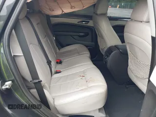 2015 Cadillac SRX with VIN 3GYFNAE30FS569009, listed as a IAAI auction lot 41718522 with 104,448 mi miles and . Bid and sale history available at DreamBid. Image 8.