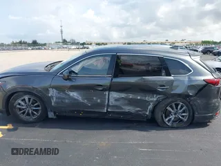 2021 Mazda CX-9 Touring с VIN JM3TCACY4M0511512, выставлен на аукционе IAAI как лот 42376544 с пробегом 50 485 миль миль и . История ставок и продаж доступна на DreamBid. Изображение 6.