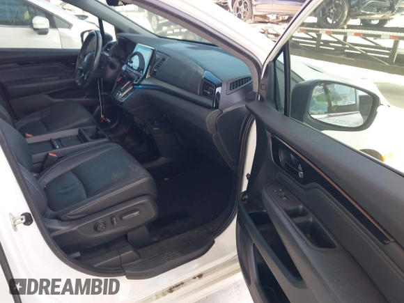 2021 Honda Odyssey Touring z VIN 5FNRL6H80MB003323, wystawiony jako IAAI lot #42303968 z przebiegiem 51 531 mil mil oraz . Historia ofert i sprzedaży dostępna na DreamBid. Obrazek 5.