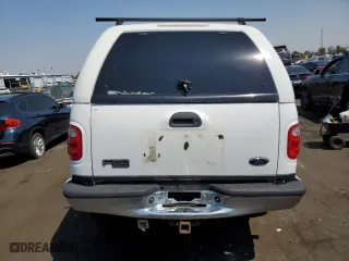 2001 Ford F-150 SuperCrew XLT with VIN 1FTRW08L31KF24186, listed as a Copart auction lot 65188904 with 0 mi miles and Salvage Title. Bid and sale history available at carsss.com. Image 6.