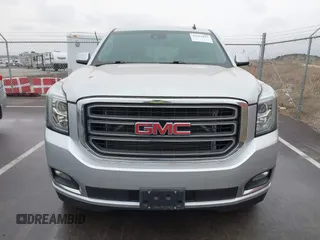 2015 GMC Yukon SLT with VIN 1GKS2BKCXFR131919, listed as a IAAI auction lot 41664827 with 149,398 mi miles. Bid and sale history available at carsss.com. Image 13.