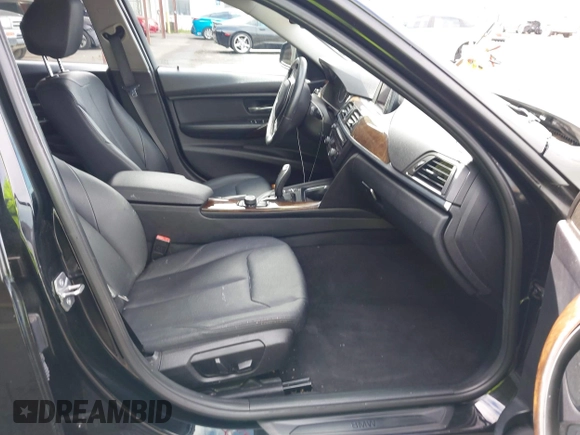 2015 BMW 3 Series 328i with VIN WBA3C1C53FK119723, listed as a IAAI auction lot 41871200 with 112,552 mi miles and . Bid and sale history available at carsss.com. Image 5.