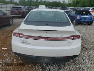 2016 Lincoln MKZ Hybrid с VIN 3LN6L2LU6GR631594, выставлен на аукционе Copart как лот 56802665 с пробегом 130 871 миль миль и Списание • Salvage title. История ставок и продаж доступна на DreamBid. Изображение 6.