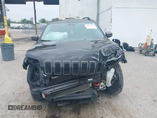 2021 Jeep Cherokee Trailhawk with VIN 1C4PJMBX0MD167941, listed as a IAAI auction lot 42507379 with 70,414 mi miles and . Bid and sale history available at DreamBid. Image 13.