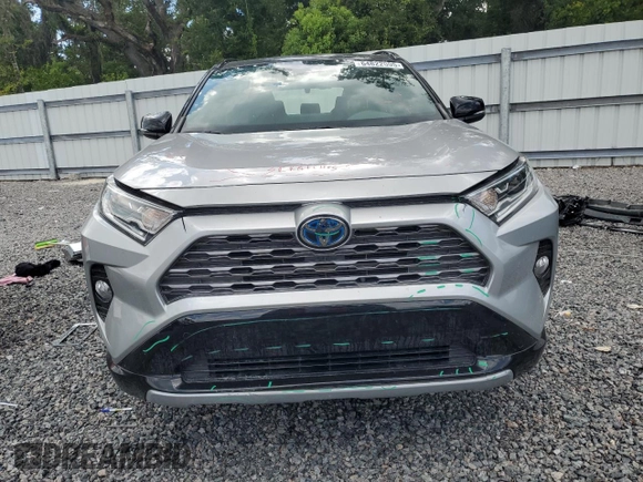 2021 Toyota RAV4 Hybrid XSE with VIN 2T3E6RFVXMW020561, listed as a Copart auction lot 64822005 with 39,434 mi miles and Salvage title. Bid and sale history available at DreamBid. Image 5.