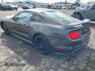 2018 Ford Mustang EcoBoost with VIN 1FA6P8TH1J5176443, listed as a IAAI auction lot 41778053 with 50,708 mi miles and . Bid and sale history available at carsss.com. Image 3.