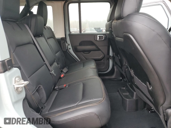 2024 Jeep Wrangler Sahara with VIN 1C4PJXEGXRW210206, listed as a Copart auction lot 58059115 with 14,492 mi miles and Salvage title. Bid and sale history available at DreamBid. Image 11.