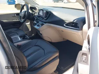 2023 Chrysler Pacifica Hybrid Touring L with VIN 2C4RC1L75PR614460, listed as a IAAI auction lot 42628545 with 68,668 mi miles and . Bid and sale history available at DreamBid. Image 5.