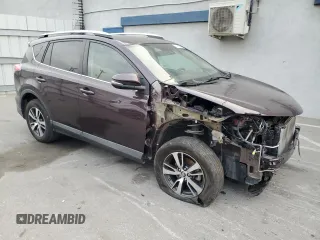 2017 Toyota RAV4 XLE with VIN 2T3WFREV0HW371653, listed as a Copart auction lot 43712935 with 96,694 mi miles and Salvage Title. Bid and sale history available at carsss.com. Image 4.