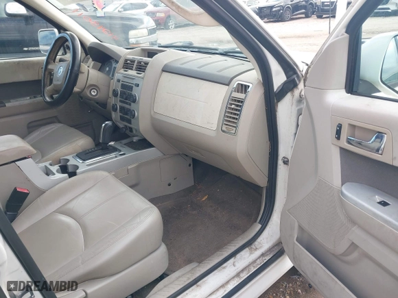 2009 Mercury Mariner Premier with VIN 4M2CU87G69KJ08671, listed as a IAAI auction lot 41243011 with 247,168 mi miles. Bid and sale history available at carsss.com. Image 5.