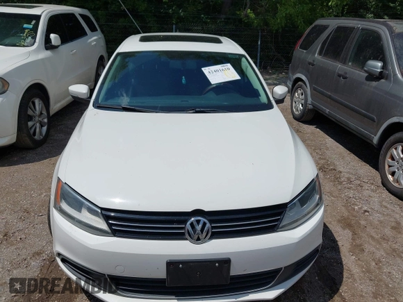 2013 Volkswagen Jetta TDI w/Premium/Nav with VIN 3VWLL7AJ9DM300544, listed as a IAAI auction lot 42401610 with 157,585 mi miles and . Bid and sale history available at DreamBid. Image 6.