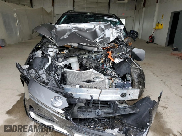 2024 Toyota bZ4X XLE with VIN JTMAAAAA1RA046054, listed as a Copart auction lot 53476515 with Not Provided miles and Salvage Title. Bid and sale history available at DreamBid. Image 5.