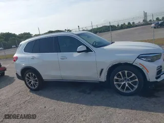 2019 BMW X5 xDrive40i with VIN 5UXCR6C50KLL04572, listed as a IAAI auction lot 41866113 with 56,642 mi miles. Bid and sale history available at carsss.com. Image 14.